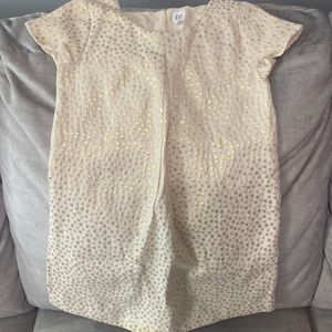 Used girls gap dress size Small. Small yellow stain on bottom of dress